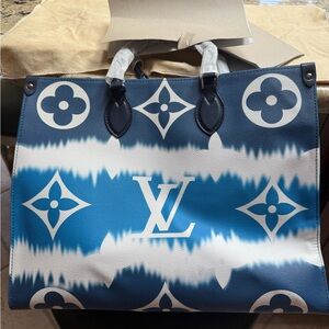 Louis Vuitton Blue Tote Bag with Artistic Monogram Design